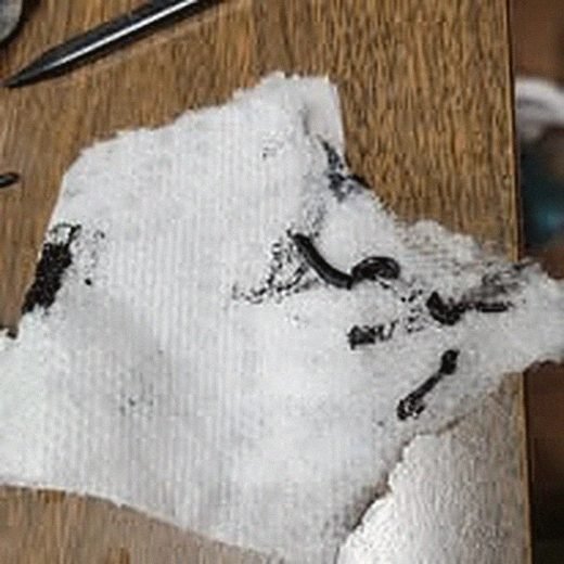 Cleaning rag and sticky drive-belt residue from a VCR repair