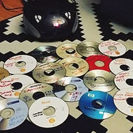 Stack of CDs and DVDs on the shop counter
