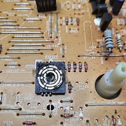 Wide view of a television circuit board pulled for diagnosis